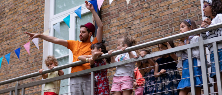 Story teller Elias Matar tells a story to children